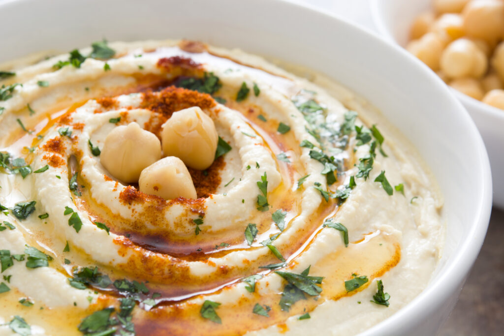 Hummus,On,A,Rustic,Wooden,Table